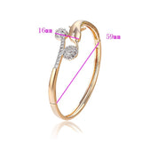 Elegant Gold Plated Dolphin Bangle 